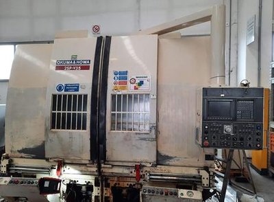 OKUMA  2SP-V35 vertical turret lathe with cnc
