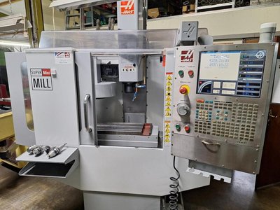 CNC milling machine Haas Super Mini Mill HE machining center