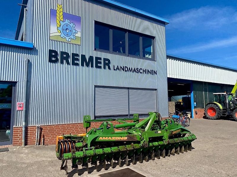 Amazone CATROS + 5001-2 з клиновим валиком та горлом. Посада