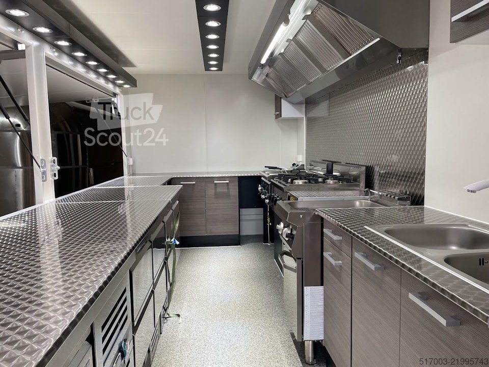 Sale tag, noodle, pommes, sausage. New food truck with pasta cooker