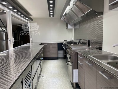 Sale tag, noodle, pommes, sausage. New food truck with pasta cooker