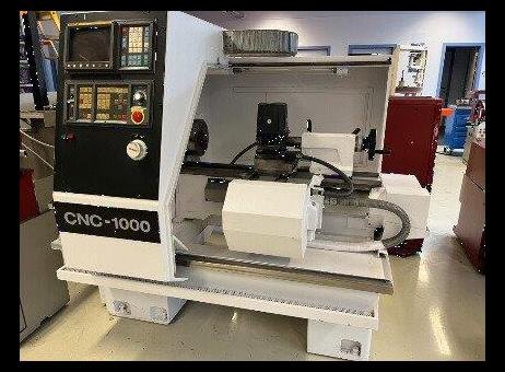 Токарный станок CNC 1000 cnc