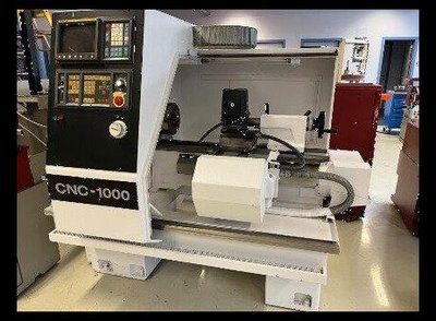 Токарный станок CNC 1000 cnc