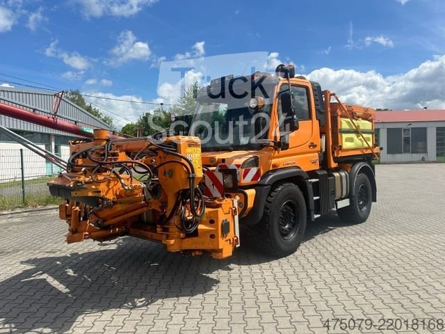 Special truck UNIMOG U 423 / mowing equipment Dücker / salt shaker used