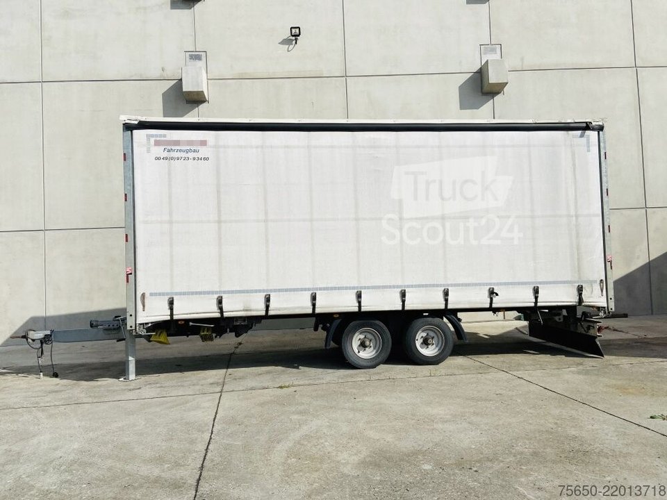 Trailer with Pritsche & Plane Möslein TP 11 Schwebheim Tandem sliding tarpaulin trailer used for loading