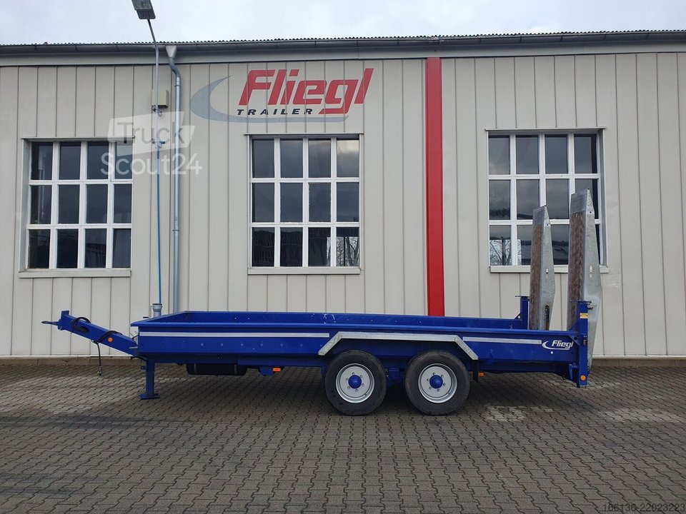 Низький причіпний Fliegl TTS 100 - 5.5m використовується