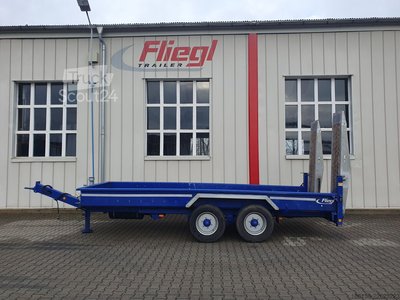 Низький причіпний Fliegl TTS 100 - 5.5m використовується