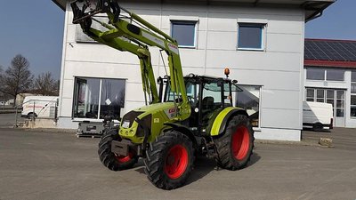 Claas Axos 310 с фронтальным погрузчиком FL 80