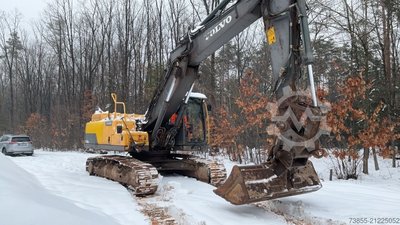Volvo EC250DNL with 3 excavator buckets