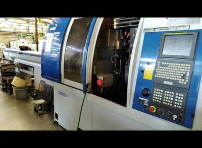 CNC automatic lathe MANURHIN KMX SWING 1032