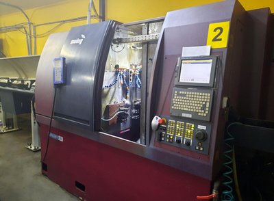 Manurhin KMX Swing 720 Multispindle automatic lathe