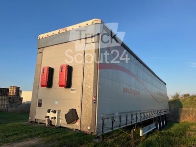 Auflieger mit Pritsche & Plane FLIEGL 3-Achs Gardine SDS 350 RoadRunner gebraucht