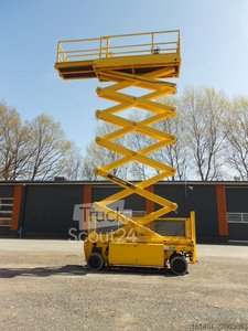 Scissors lifting platform Holland Lift HL190E12 used