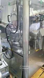 Maszyny do napełniania i uszczelniania rur kołnierzowych AXOMATIC Optima 900