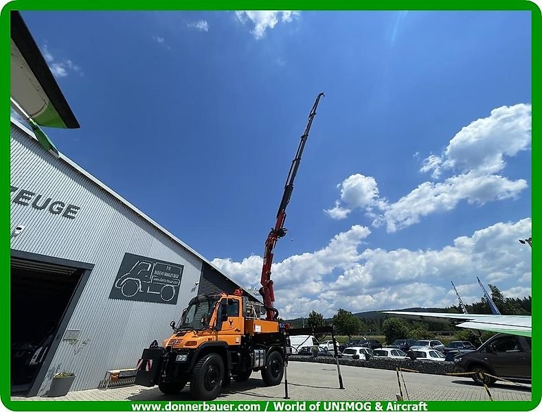 Mercedes-Benz Unimog U400 mit HMF 1823 Mega Kran , Kranseilwinde, Funk, Arbeitskorb