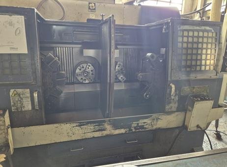 Hwacheon ECO-2SP3 twin-spindle twin-turret CNC lathe · 1995