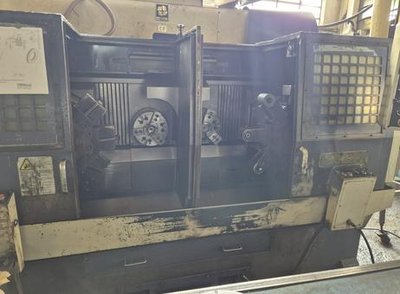 Hwacheon ECO-2SP3 twin-spindle twin-turret CNC lathe · 1995