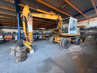 Mobilbagger LIEBHERR A 312 / Mobilbagger / New Motor gebraucht
