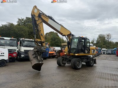 Mobilbagger Caterpillar M318D Schnellwechsler Schwenkfunktion OilQuick OQ70 55 Klima Verstellausleger gebraucht