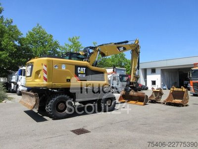 Mobilbagger caterpillar M 318 F Schnellwechsler, Reifen neu , 3xSchaufel gebraucht