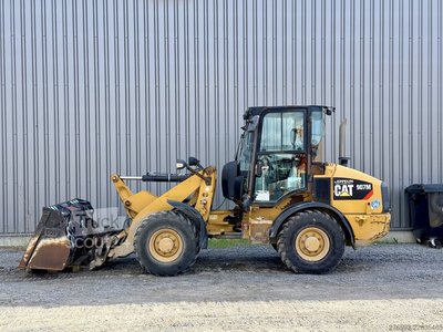 Radlader Caterpillar 907M gebraucht