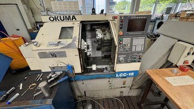 CNC Drehmaschine OKUMA LCC 15 – OSP500 Präzisionsdrehmaschine